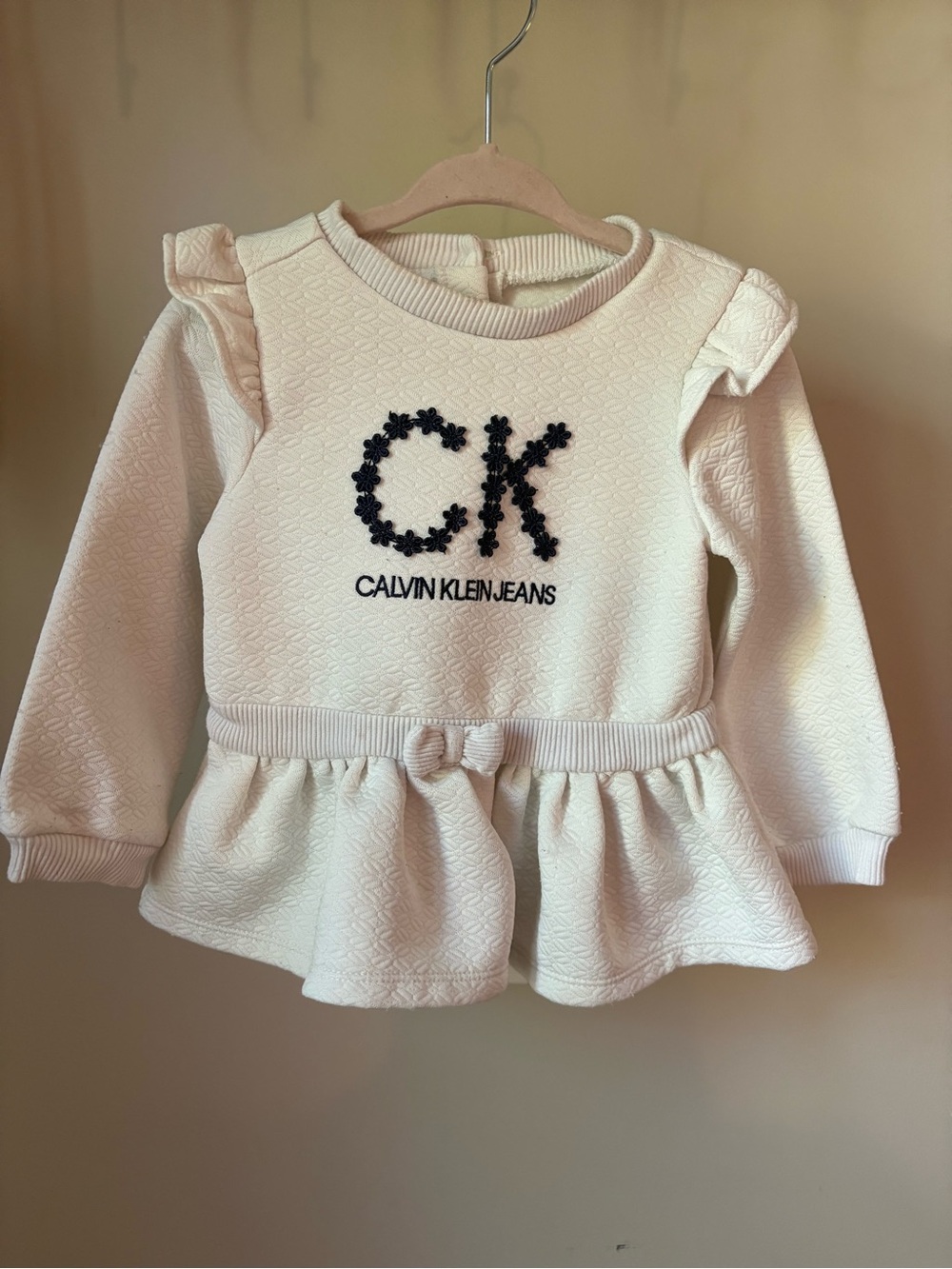 Calvin Klein Jeans Cream Peplum Sweatshirt with Black CK Logo